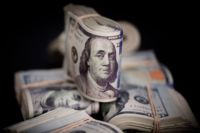 El dólar, un viaje de ida